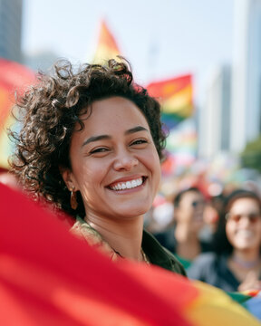Radiant woman smiling joyfully during the vibrant and inclusive Parade LGBT Sao Paulo celebration in the middle of a sunny city street