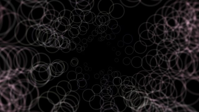 Floating circles swirl across a dark background. Shimmering lines form an abstract