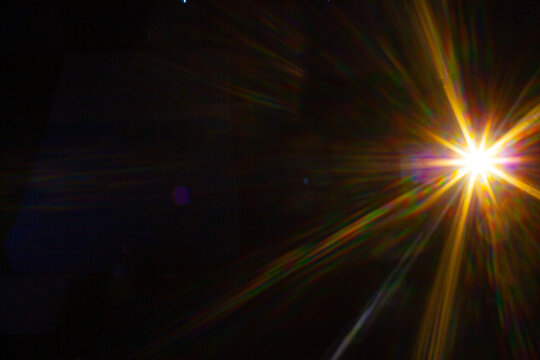 Sun flare on the black background