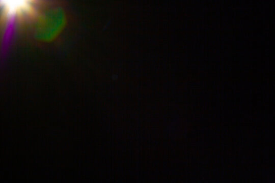 Sun flare on the black background