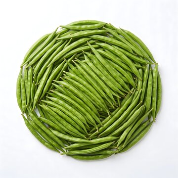 Fresh green cluster beans in circular arrangement, organic guar beans on white background, raw vegetable legumes for healthy cooking