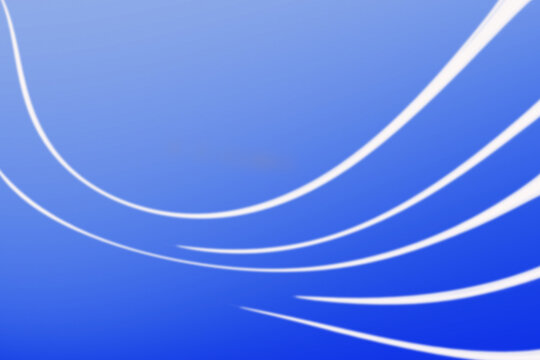 Soft white curved lines spreading from right to left against a blue gradient background.