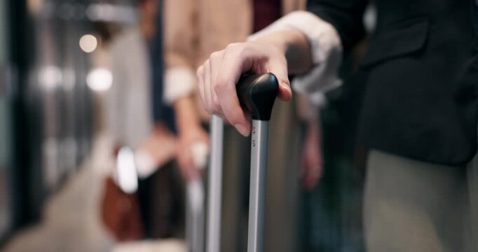 Hands, people and waiting with suitcase handle for business travel, work trip or migration. Employees, colleagues or travelers with luggage in row or line for flight, boarding or job opportunity