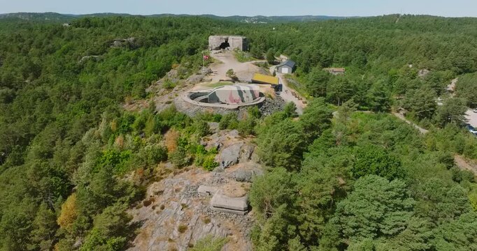 Aerial view of M&oslash;vik Fort World War Two coastal battery near Kristiansand in slow motion showing Vest Agder