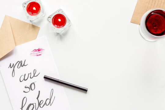concept of Valentine Day love letter white background top view