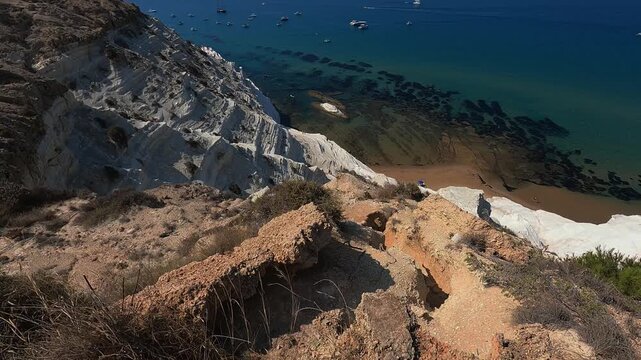 Peaceful mediterranean beach scene with clear water at Scala dei Turchi, Sicily