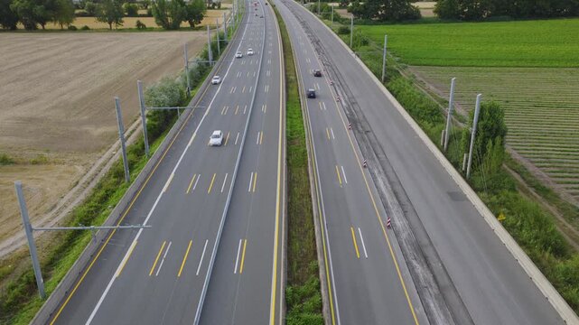 Aerial view of the eHighway test track with overhead power lines for electric trucks on the highway in Weiterstadt, Hessen, Germany.