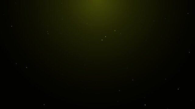 Golden dust particles floating in dark space