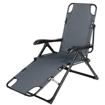 Grey folding sun lounger chair isolated on white background. Reclining outdoor beach chair for garden, patio, and camping relaxation