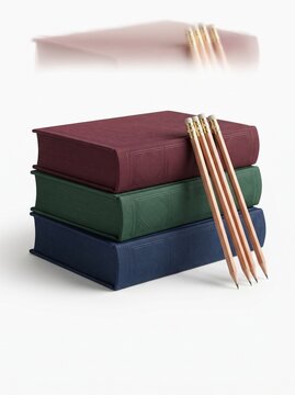 Vintage hardcover books in burgundy green and blue, stack of classic fabric bound journals, natural wood pencils leaning on old book collection
