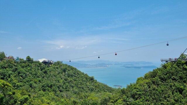 Langkawi SkyCab cable cars above tropical rainforest, Malaysia