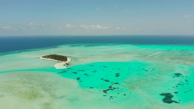 Sand beach and tropical islands by atoll with coral reef, top view. Onok Island, Balabac, Philippines. Summer and travel vacation concept