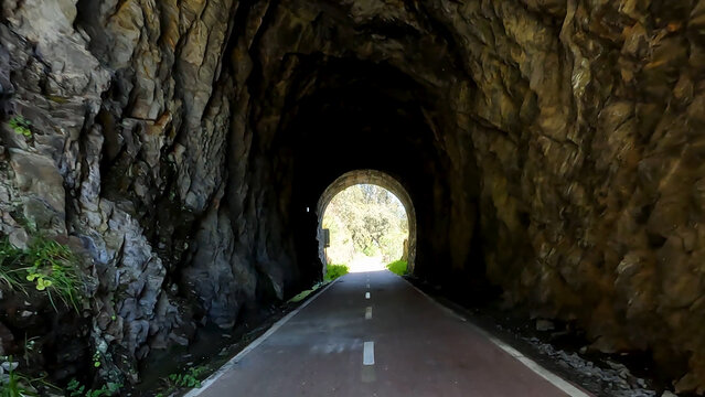 Point of View Shot Riding a Bicycle Through a Rock Tunnel in Sever do Vouga, Portugal