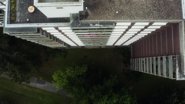 Rooftop balconies drop below in this vertigo-inducing pan across Cologne