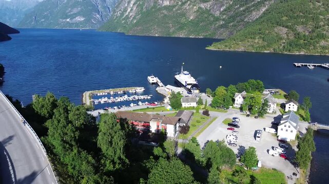 Drone Zoom Out Over Hellesylt Harbor and Ferry Terminal in Norway