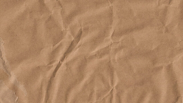 Frame made of brown beige old vintage paper, crumpled wrinkled cardboard carton packaging pattern texture background banner panorama