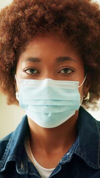 Woman, face and mask for virus prevention with healthcare, safety and caution for viral infection. Black person, portrait and facial cover for compliance, sick or stop spread of respiratory germs
