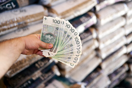 Golden brown pellets with cash