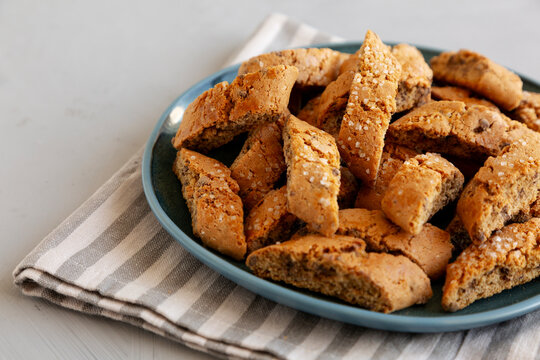 Homemade Chocolate Cantucci Pastry on a Plate, side view.