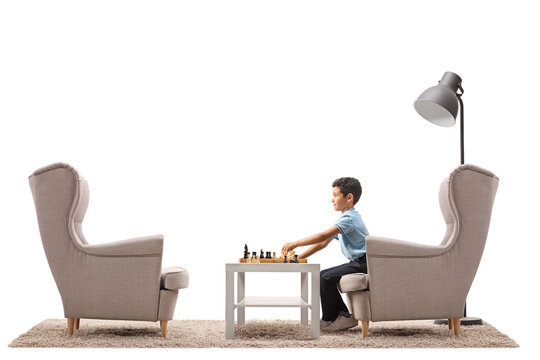 Boy playing chess alone