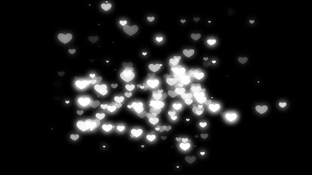 Luxury romantic floating heart particles animation featuring white, white love symbols, shimmering glow effects, valentine's day wedding overlay, elegant motion graphics on black background 4k