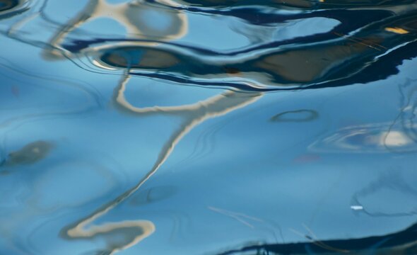 Abstract sea surface background with lines and water reflection, sea and water background