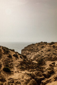 Dry coastal ravine opening toward the Atlantic Ocean in Morocco