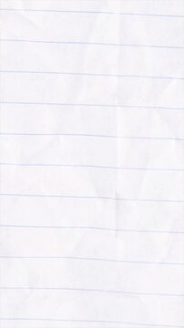 Close up of a lined paper texture from a notebook.