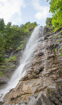 rock face with waterfall Tatschbachfall near Engelberg, switzerland