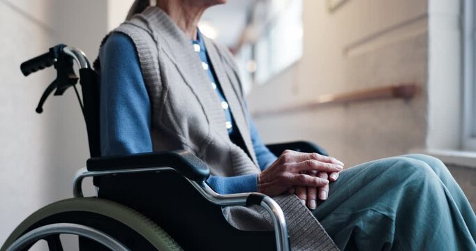 Thinking, lonely and senior woman in wheelchair with reflection, nostalgia and sadness. Retirement, nursing home and person with disability with worry, thoughtful and overthinking for memory loss