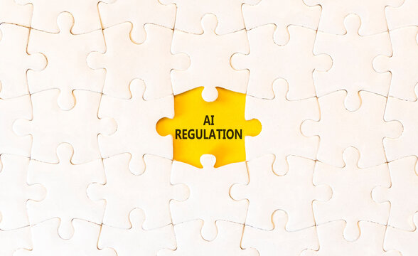 AI regulation symbol. Concept words AI artificial intelligence regulation on beautiful yellow paper. Beautiful puzzles background. Business AI artificial intelligence regulation concept. Copy space.