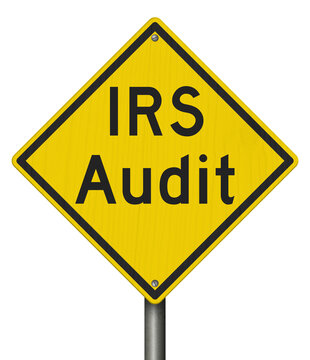 IRS Audit yellow warning sign isolated on white tax review