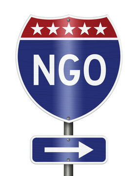 NGO text on an American interstate road sign isolated on white for non-government organization