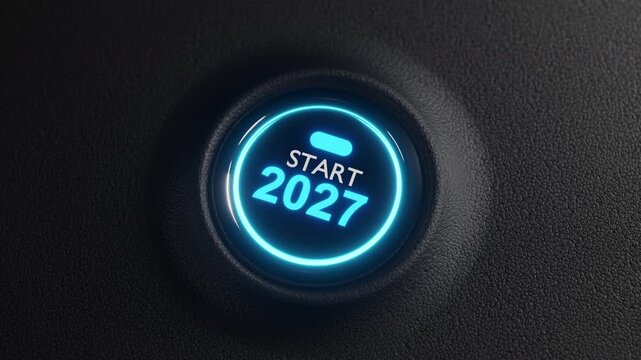 Finger about to press a car ignition button with the text 2027 start.happy new year 2027 start new project.concept of start with strategy,win,plan,goal and objective target