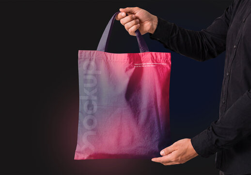 Hand Holding Tote Bag Mockup PSD