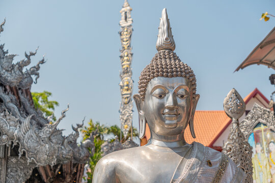 Chiang Mai, Thailand-February 10, 2026;  Close up of buddha statue at Wat Sri Suphan known as the Silver Temple showcases the meticulous hand-tooled metalwork of local Lanna artisans. 