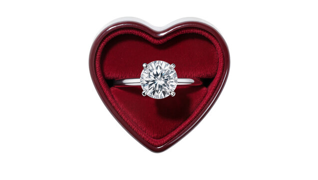Diamond engagement ring in a red heart-shaped box, isolated on transparent background