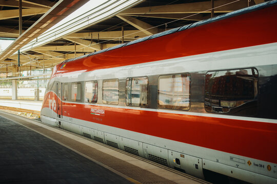MADRID, SPAIN - JUNE 1, 2026: Iryo Frecciarossa high speed train standing at platform in railway station.