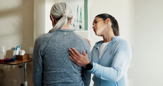 Physical therapy, women and shoulder blade pain in session for healing, consultation and healthcare. Person, senior patient and back injury with rehabilitation, chiropractic and wellness or massage