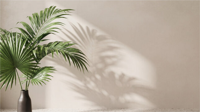 Green palm leaf in a vase. Tropical plant casting shadows on a beige wall background.