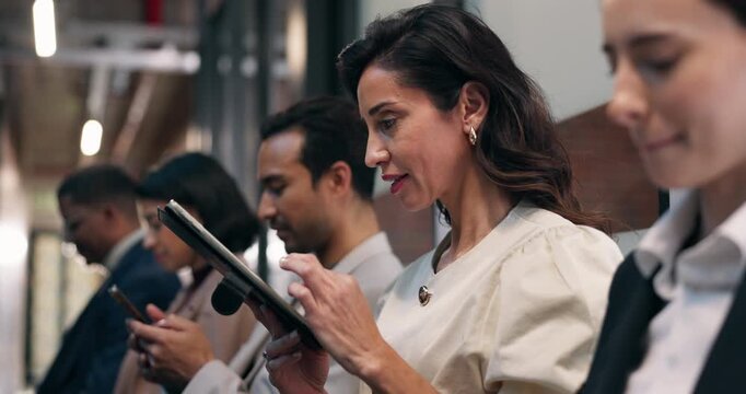 People, tablet and waiting room with staff in office for workshop, job opportunity or research. Woman, employees or colleagues with technology or app for career search, hiring or recruiting process