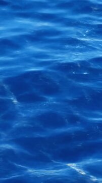 Close up view of deep blue water showing light reflections and textures during mid-afternoon hours