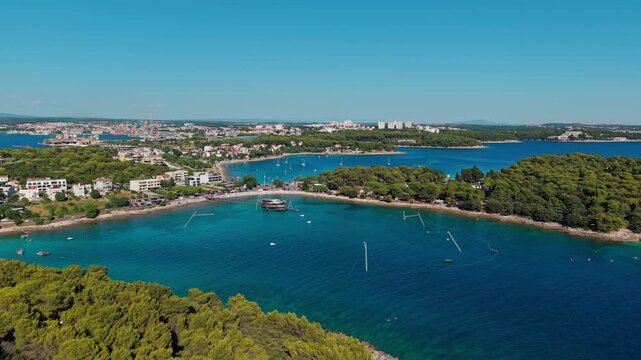 Drone aerial view of Pula harbor and Adriatic coastline in Croatia
