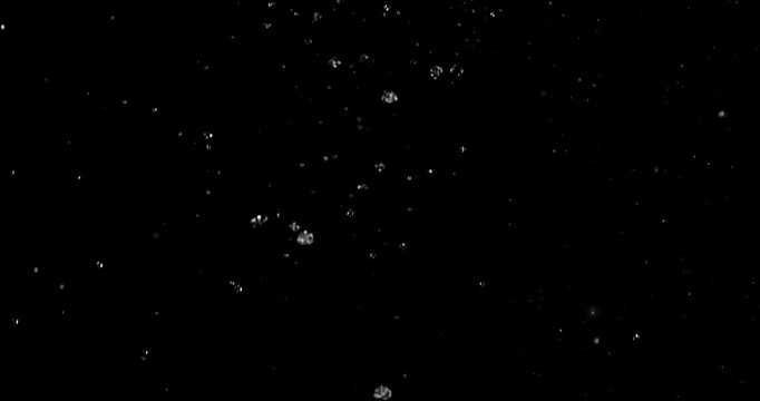 Ultra slow motion falling water droplets isolated on a black background creating a realistic rain VFX overlay. Perfect for cinematic compositing visual effects and motion graphic.