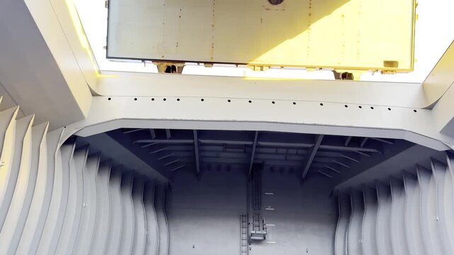 commercial bulk carrier ship cargo hold and hatch covers view from inside.