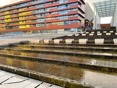 The modern city of Almere in a bright blue cloudy sky, at sunset  Almere, Flevoland, the Netherlands, July, 2026