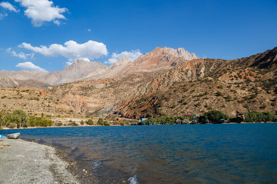 Beautiful alpine lake surrounded by rocky ridges in Fann Mountains, Tajikistan