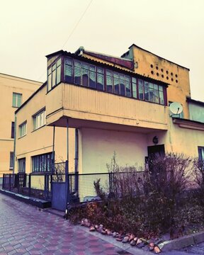Brest, Belarus - November 29, 2019: Historic building in functionalism style built in 1930s with a large cantilever balcony