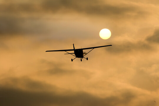 Germany, Hesse, Sports plane Cessna 152 in the evening