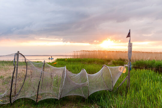 Germany, Usedom, Loddin, fish trap at sunset